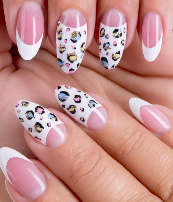 Beautiful woman's nails with beautiful french manicure