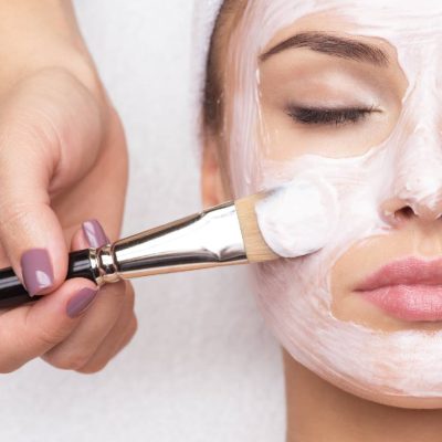 receiving-facial-mask-at-beauty-salon-1