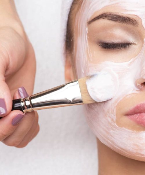 receiving-facial-mask-at-beauty-salon-1